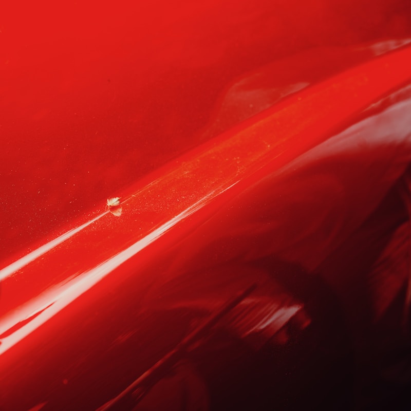 Macro of deep glossy solid-color car paint